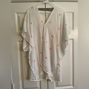 White loose fitting cover up with flamingos on it